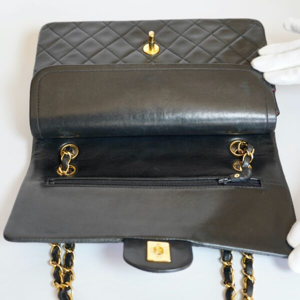 Pre-loved Chanel Classic Flap Handbag - Black lambskin - Eclate Shop