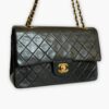 Pre-loved Chanel Classic Flap Handbag - Black lambskin - Eclate Shop